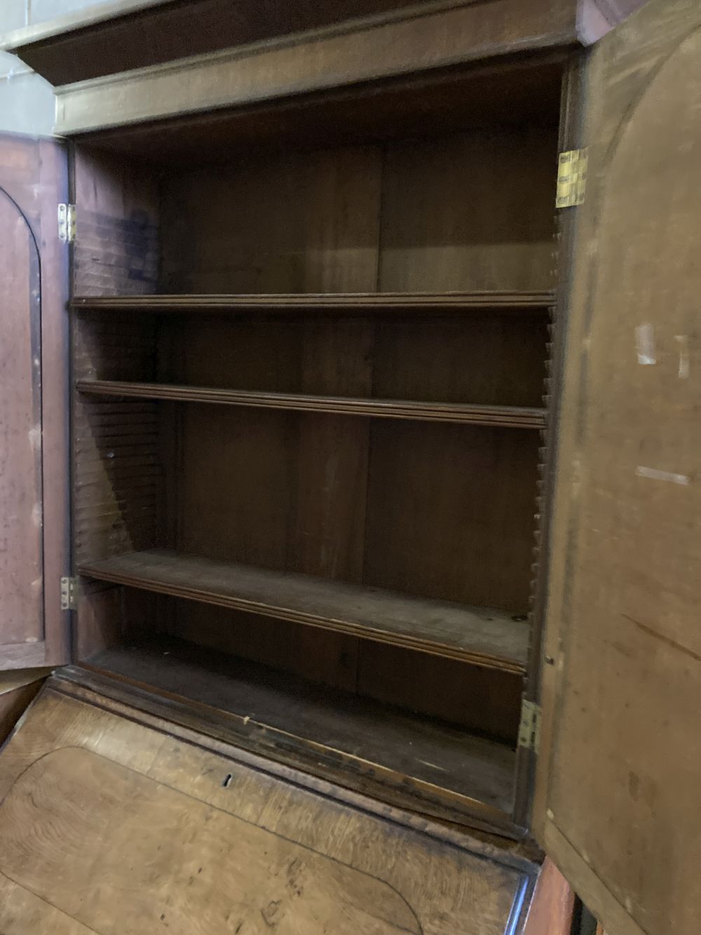 A George III oak bureau bookcase, width 98cm, depth 52cm, height 219cm